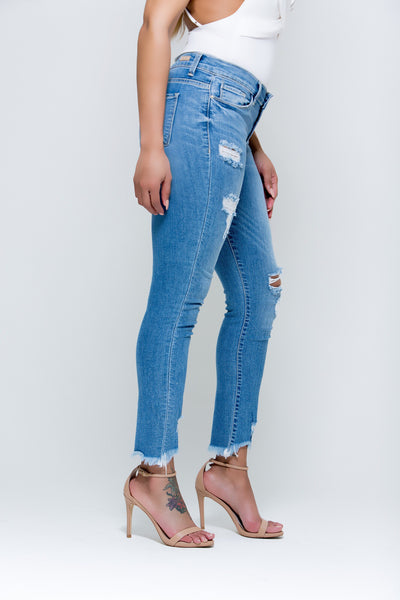 Distressingly Unraveled Mid Rise Jeans