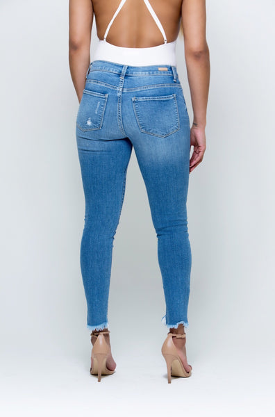 Distressingly Unraveled Mid Rise Jeans