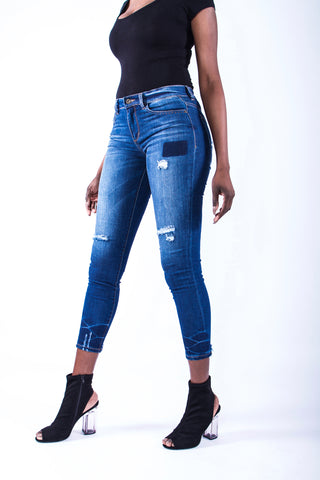 Patches Distressed Mid Rise Jeans